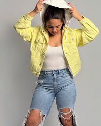 Oversized yellowish denim jacket with hood