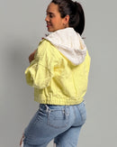 Oversized yellowish denim jacket with hood