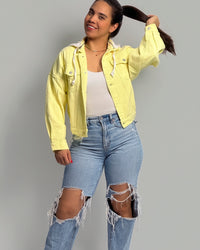 Oversized yellowish denim jacket with hood